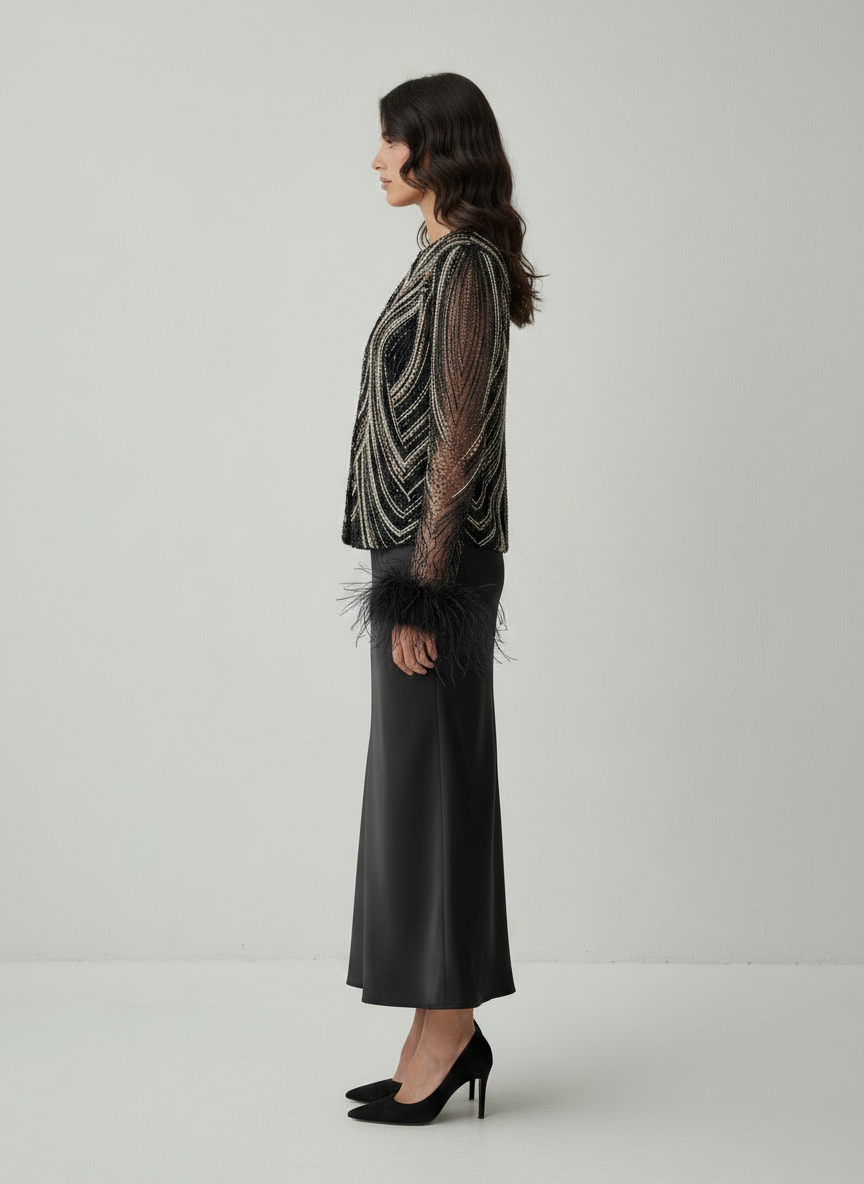 Sadri Couture Lumina Jacket with hand-applied beadwork and sequins, close-up of fabric and hardware detail.