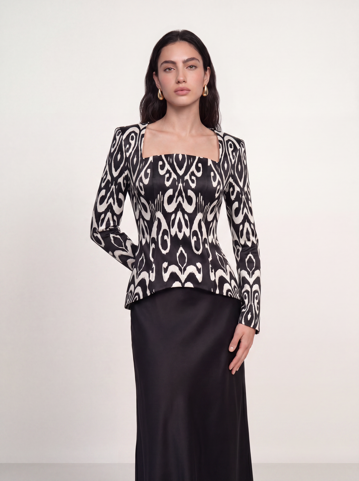 Sadri Couture Marvorid Top, an ikat-print structured top with a square neckline, back view.