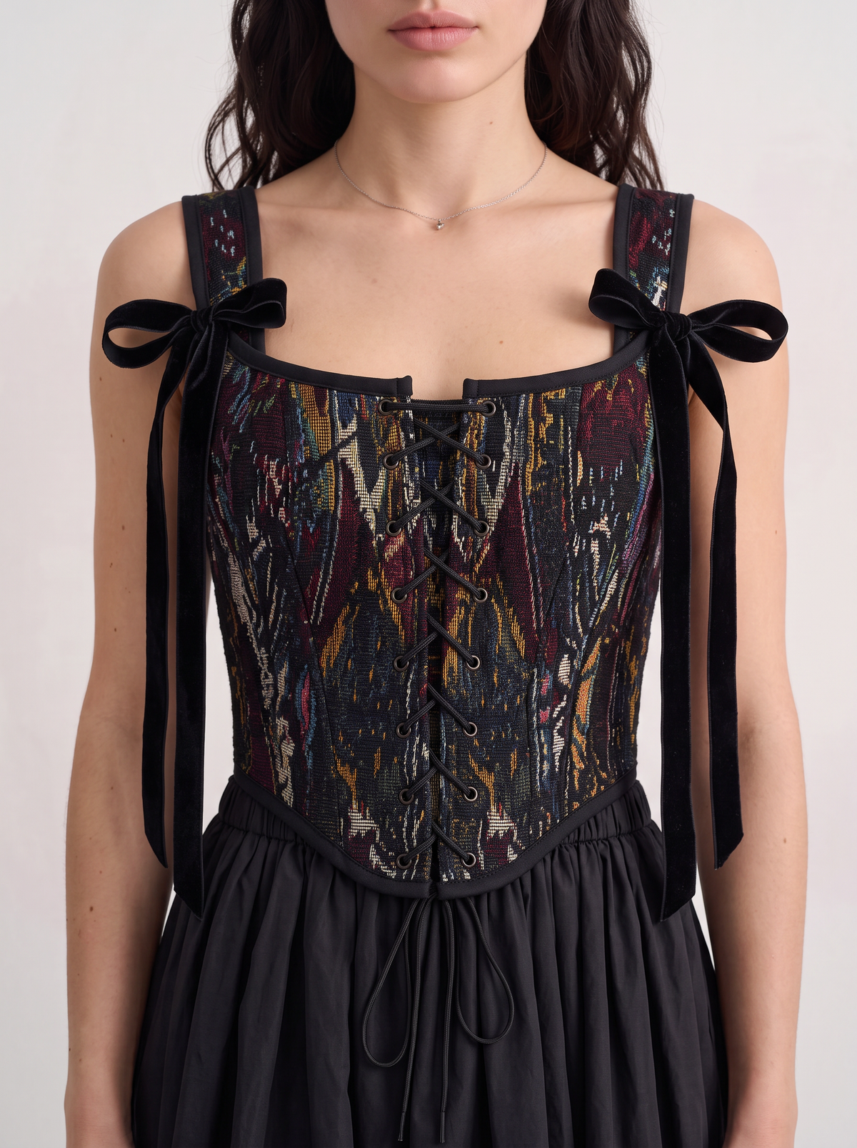 Sadri Couture Vintage Atlas Lace Corset in ikat atlas with French lace, back view.