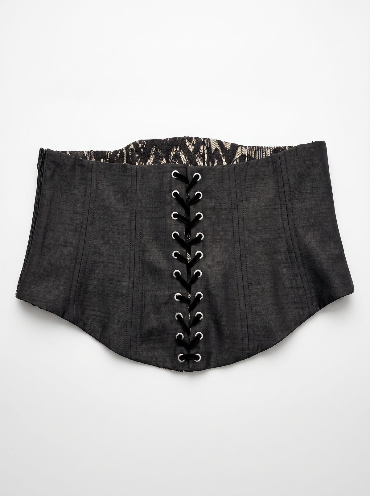 A black structured corset waist with front lace-up closure and a patterned inner lining, shown flat against a light gray background.