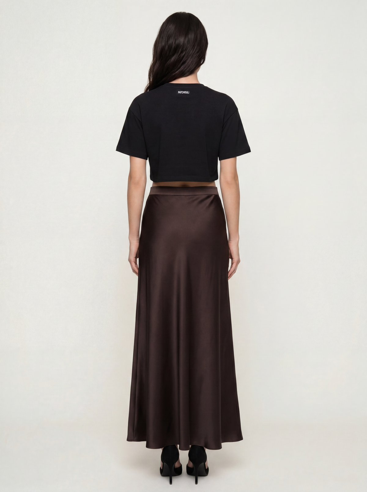 Sadri Couture Pari Skirt, a bias-cut crepe-back satin skirt, full-length styled photo.