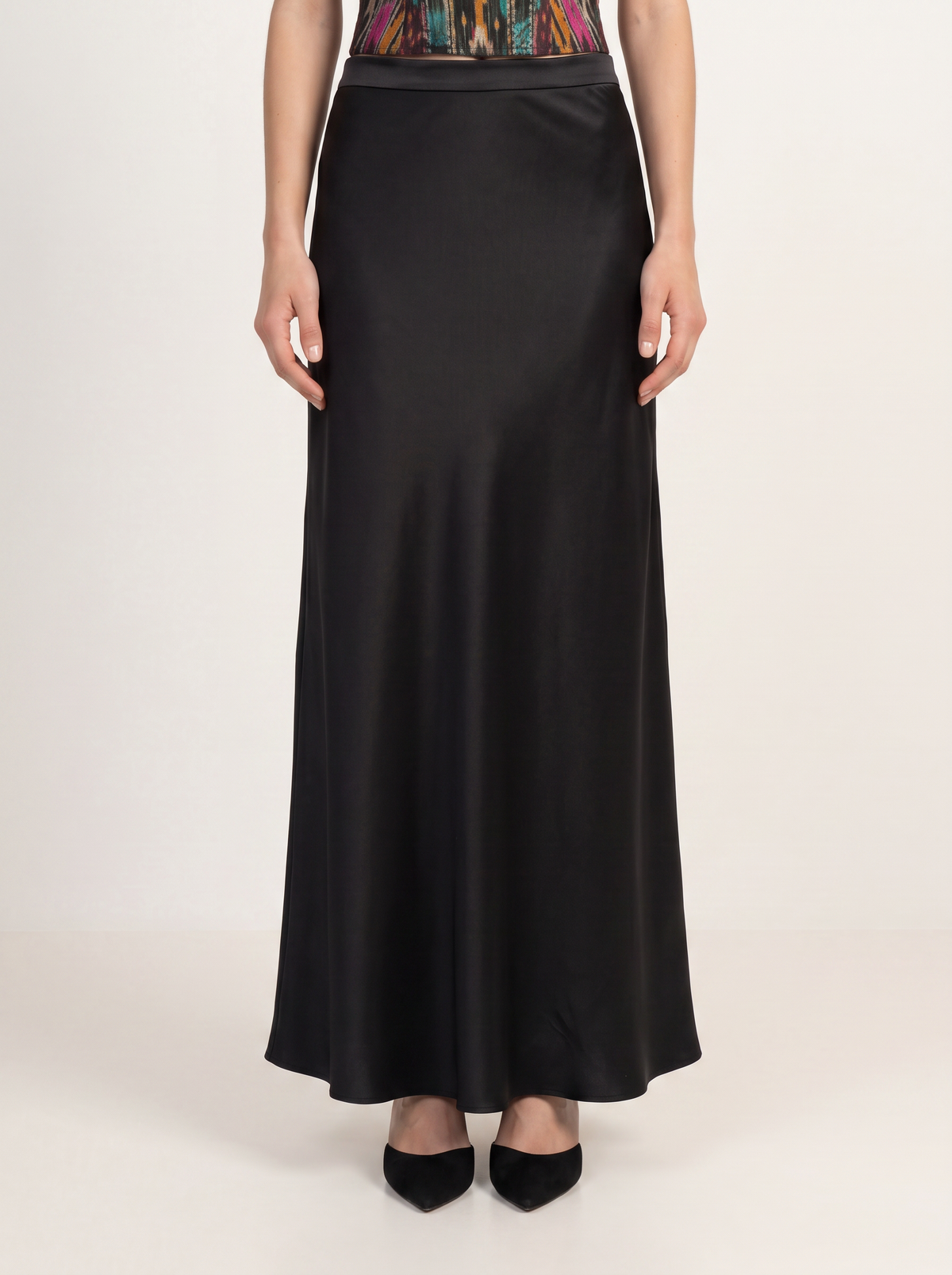 Sadri Couture Pari Skirt, a bias-cut crepe-back satin skirt, close-up of texture detail.