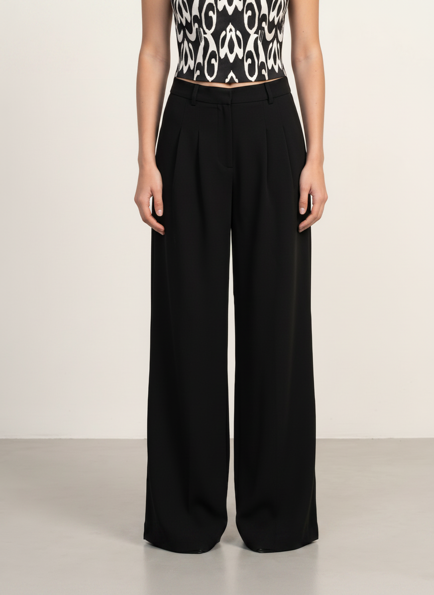 Sadri Couture Roya Pants, tailored crepe-back satin trousers, close-up of construction detail.