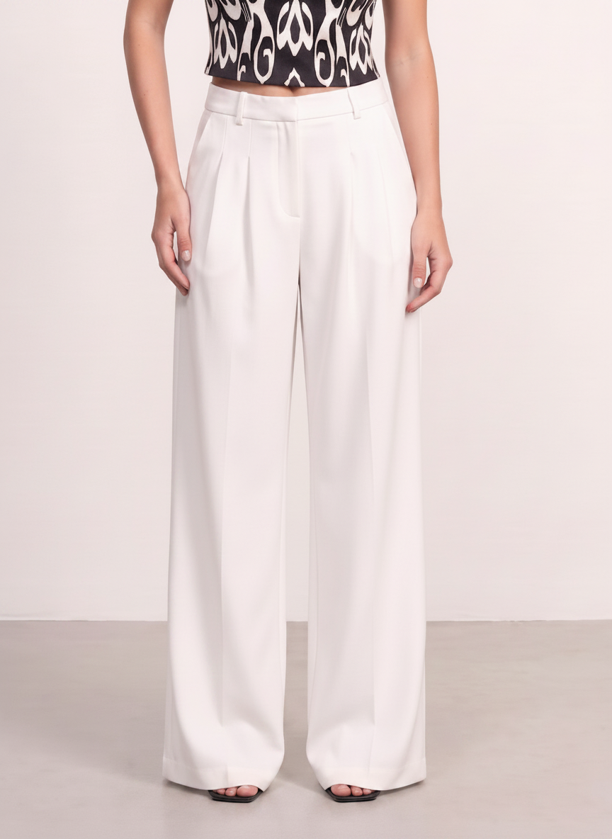 Sadri Couture Roya Pants, tailored crepe-back satin trousers, close-up of texture detail.
