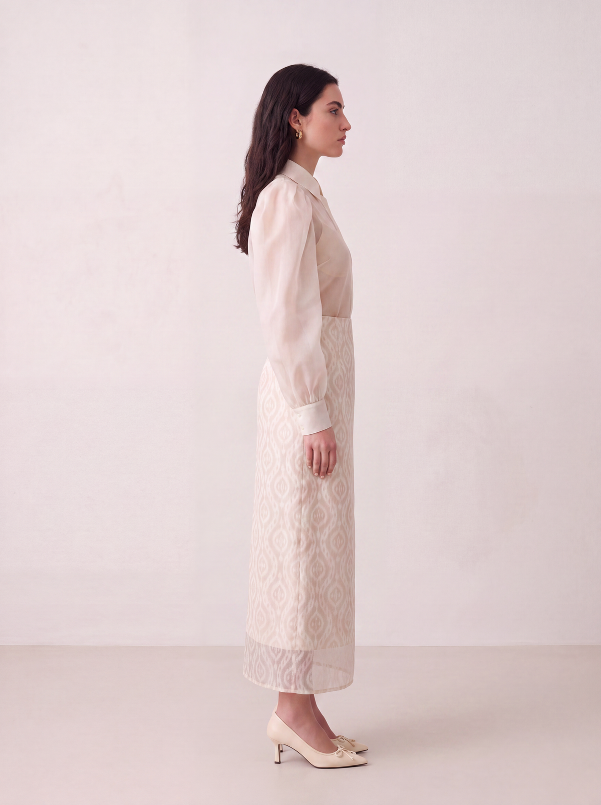 Sadri Couture Noor Ikat Skirt with sheer organza overlay, close-up of fabric and hardware detail.
