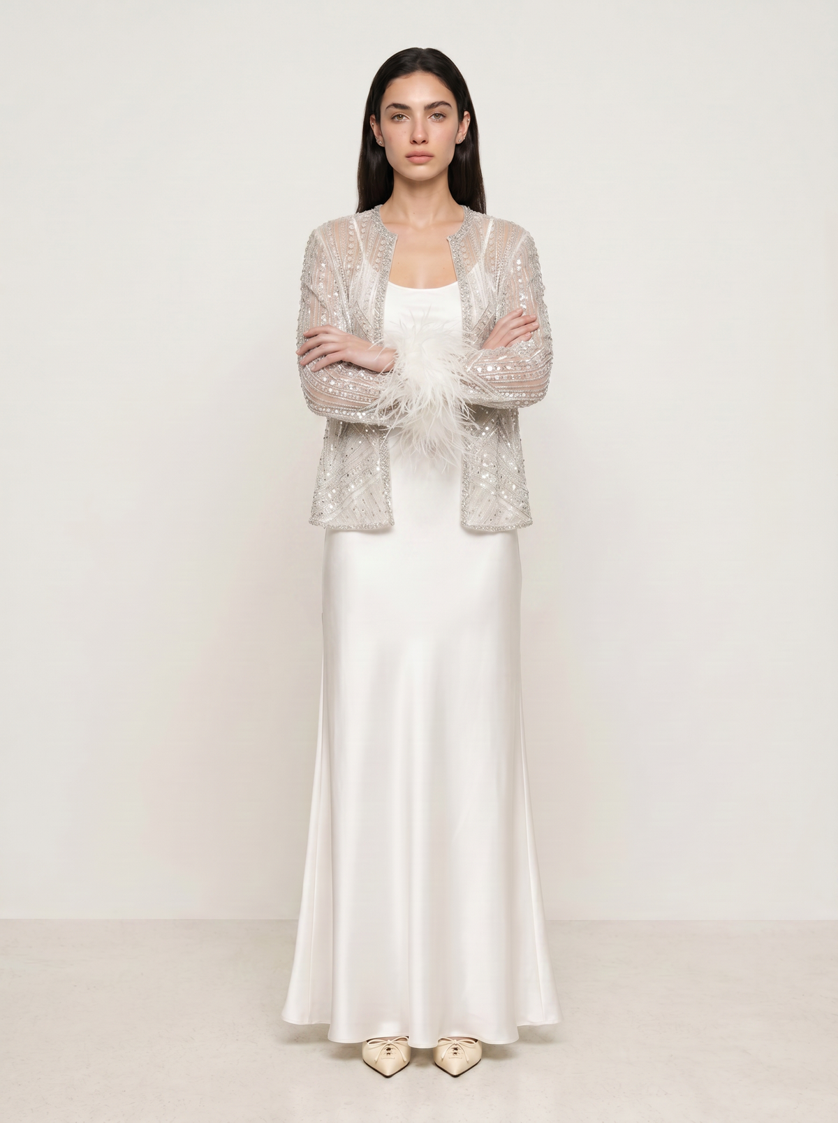 Sadri Couture Lumina Jacket in white with hand-embellished shimmering detail, close-up of fabric and hardware detail.