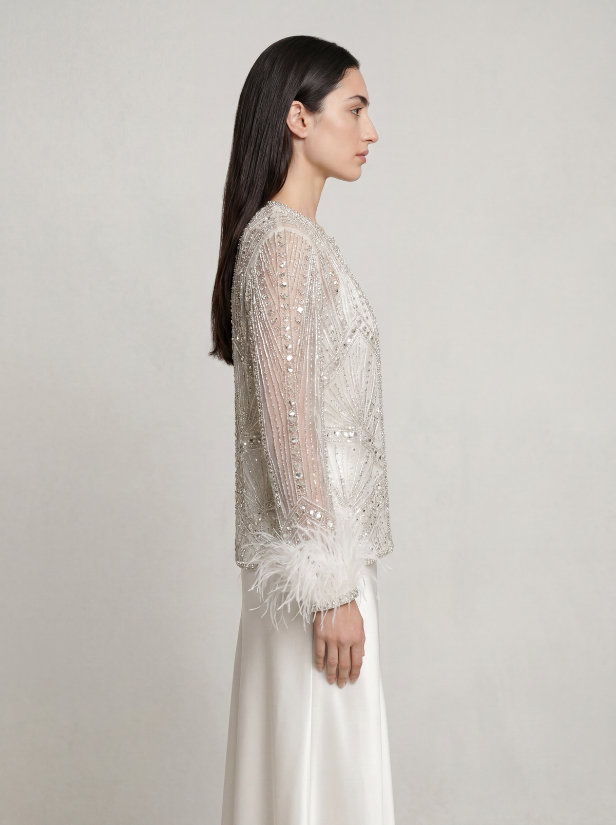 Sadri Couture Lumina Jacket in white with hand-embellished shimmering detail, back view.